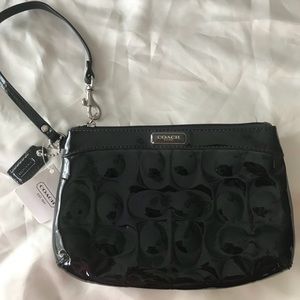 Brand new coach wristlet with the tags still on it